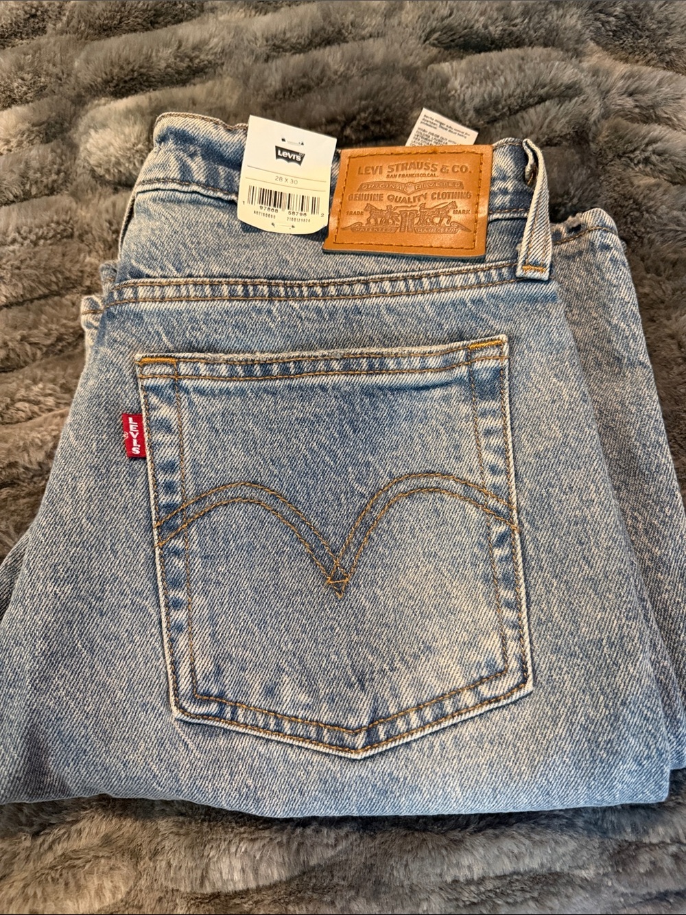 Levi's Women's Faded Light Blue High-Rise Jeans with Leather Patch